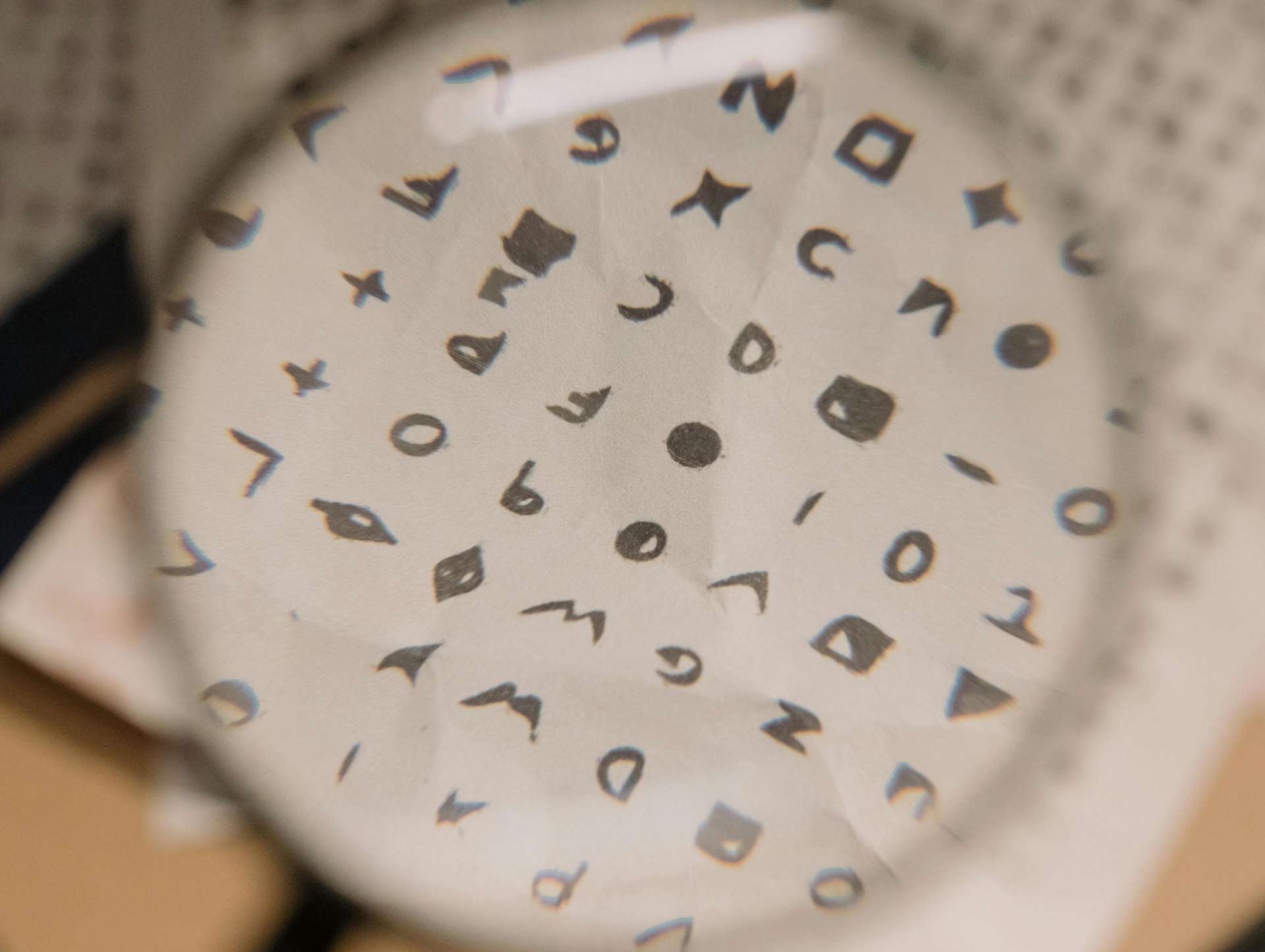 coded text viewed through a magnifying glass